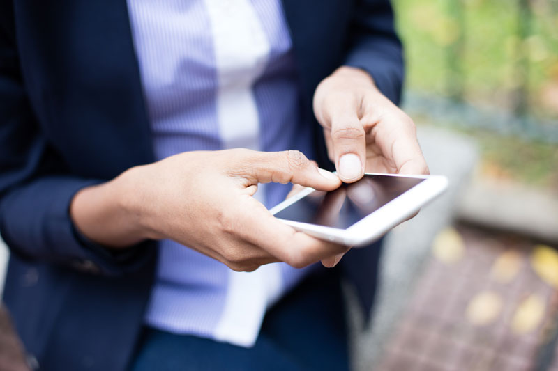 Woman messing on cell phone